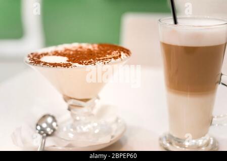 Traditional Italian dessert tiramisu in a glass beaker Stock Photo