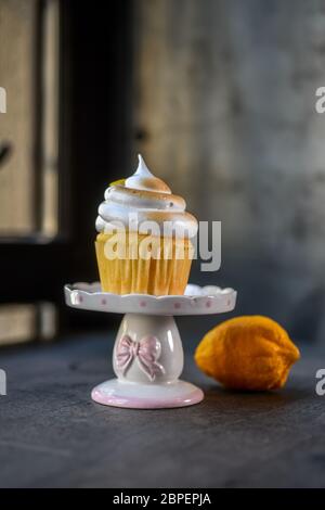 Cupcake on a wood table Stock Photo