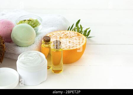 The oranges oil from orange on green studio background Stock Photo