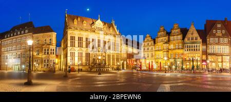 Ancient Bremen Market Square in the centre of the Hanseatic City of Bremen with Schutting and Raths-Buildings at night, Germany Stock Photo