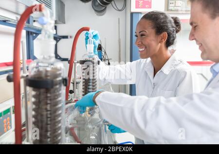 Researchers preparing test in scientific laboratory Stock Photo