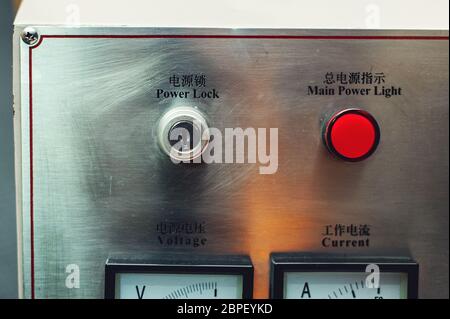 Control panel in main engine room. inscriptions in English and Chinese Stock Photo