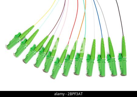 single mode fan out patch cord jumper with green fiber optic connector isolated on white background Stock Photo