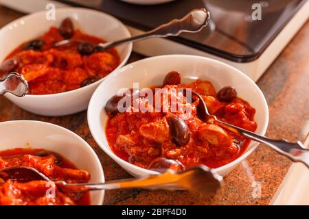 Homemade rabbit stew with vegetables and olive beans Stock Photo