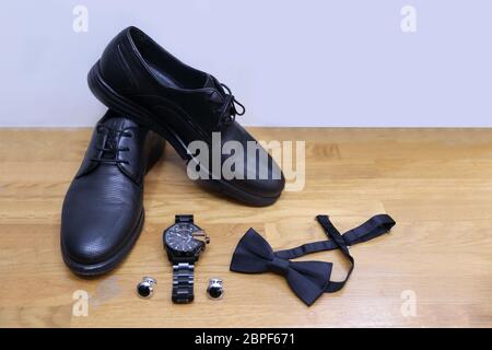 Men's accessories on wooden table Stock Photo