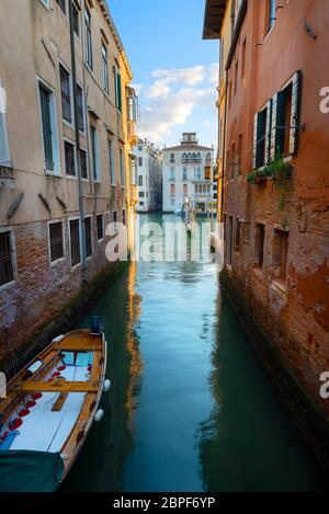 Venetian street on Grand Canal in summer morning Stock Photo