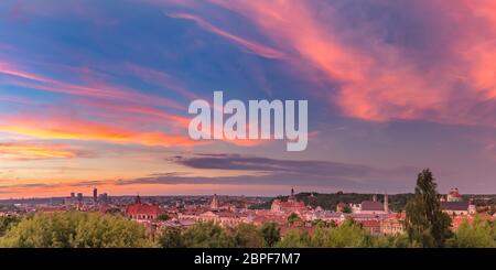 Aerial panoramic view over Old town of Vilnius and skyscrapers of New Center, Lithuania at beautiful sunrise, Baltic states. Stock Photo