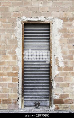 Old metal door, detail of an old closed Stock Photo