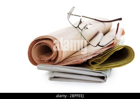 Coffee and newspapers isolated on white background. Stock Photo