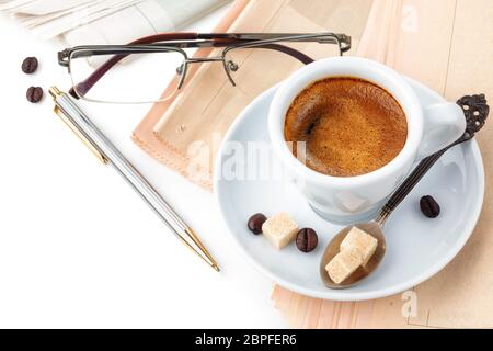 Coffee and newspapers isolated on white background. Stock Photo