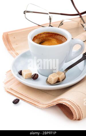 Coffee and newspapers isolated on white background. Stock Photo