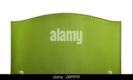 Bright green soft velvet fabric shaped bed headboard isolated on white background, front view Stock Photo