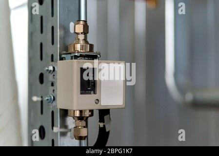 Analog device regulator for efficient automated heating system. Stock Photo
