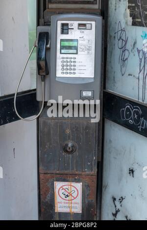 Bristol-May-2020-England-a close up view of a old public pay phone in the city center Stock Photo