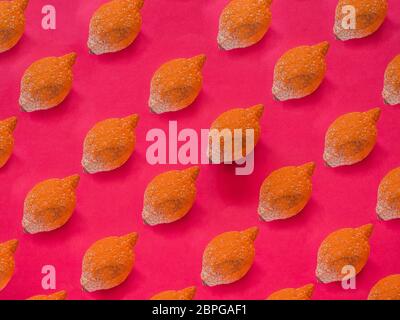 Rotten lemon pattern on strong pink background Stock Photo - Alamy