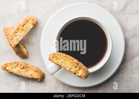 Sweet cantuccini biscuits. Italian biscotti and coffee cup. Top view. Stock Photo