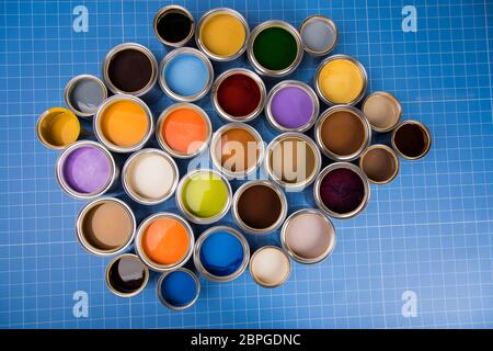 Background from multi color cans of paint Stock Photo