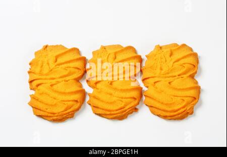 Vanilla Spritz cookies on white background Stock Photo