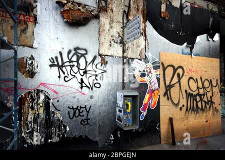 Wall covered with graffiti and street art in New York City, USA Stock Photo