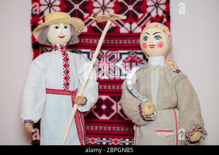 Slavic national dolls. Belorussian Ukrainian Russian ethnic dolls. Lyalka is a man and a woman in an embroidered shirt. Stock Photo