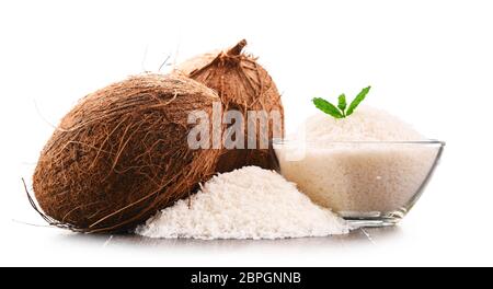 Composition with shredded coconut and shells isolated on white background Stock Photo