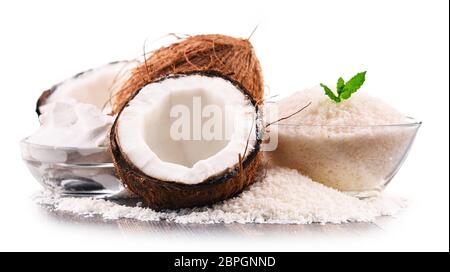 Composition with shredded coconut and shells isolated on white background Stock Photo