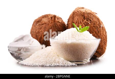 Composition with shredded coconut and shells isolated on white background Stock Photo