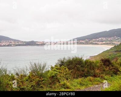 First sight of Finisterre and the Shrimp Beach (Praiade Langosteira) on an overcast day in autumn - Sardineiro, Galicia, Spain Stock Photo