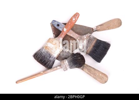 Collection of old paintbrushes, isolated on white Stock Photo