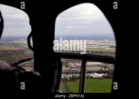 View inside helicopter looking towards Heathrow Airport Stock Photo