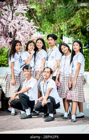 Playful Filipino school children pose in a park in Angeles City, The Philippines, South East Asia. Stock Photo