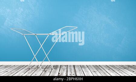 White Clothes Drying Rack on Wooden Floor Against Blue Wall with Copy Space 3D Illustration Stock Photo