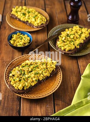 Top view of plate with delicious colorful vegan egg salad Stock Photo