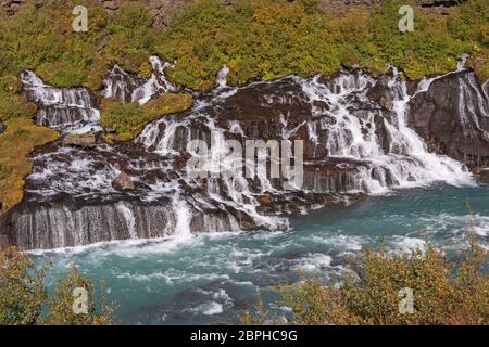 Hraunfossar falls streaming out a lava field near Husafell, Iceland Stock Photo