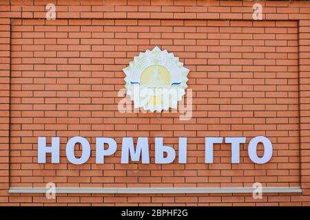 Slavyansk-on-Kuban, Russia - April 25, 2019: The emblem is the symbolism of the norms of civil labor defense. Stock Photo