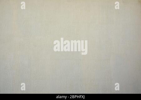 fragment of beige cement wall with irregularities, full frame Stock Photo