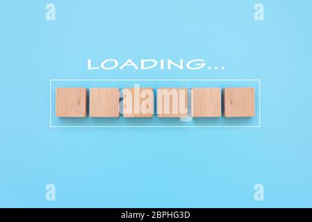 Progress bar made from wooden cubes. Loading. Top view Stock Photo