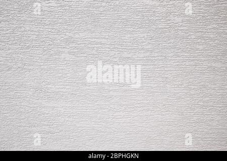 Light wall covering, background texture of the plaster on the exterior wall Stock Photo