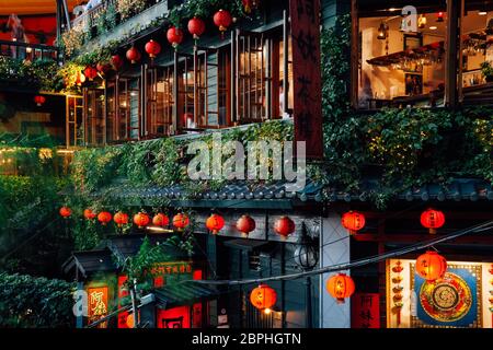 Jiufen, Taiwan - November 7, 2018: The view of the famous old teahouse decorated with Chinese lanterns, Jiufen Old Street, Taiwan on November 07 2018. Stock Photo