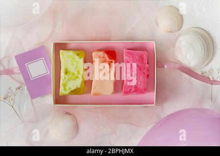 Three pieces of homemade organic natural soap in a gift box Stock Photo