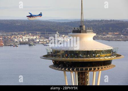 Saucer shaped top house from the air with aeroplane. Space Needle, Seattle, United States. Architect: Olson Kundig, 2020. Stock Photo