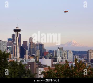 Tower and city at sunrise. Space Needle, Seattle, United States. Architect: Olson Kundig, 2020. Stock Photo