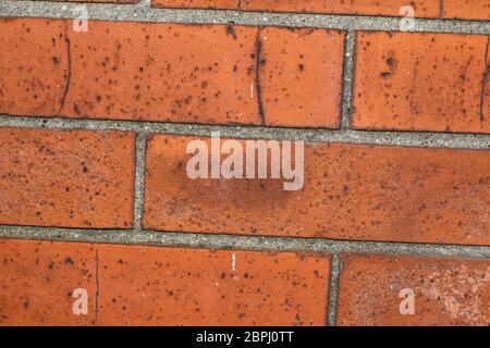 background of reddish rough brick wall Stock Photo