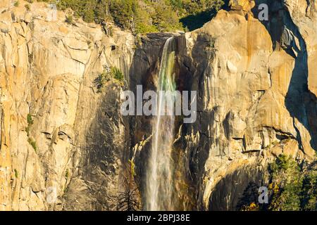 Rainbow light diffraction at the top of the Bridalveil Fall in Yosemite National Park, California, USA Stock Photo