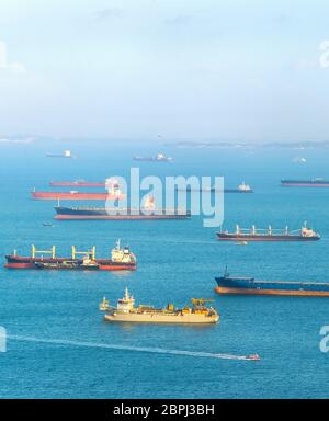 Industrial cargo shipping tankers in Singapore harbor Stock Photo