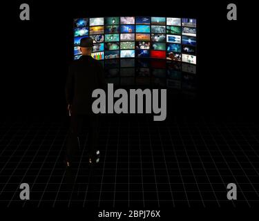 TV Screens with viewer Stock Photo