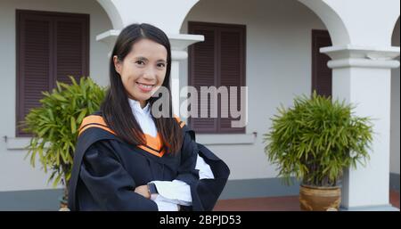Woman get graduation in university campus Stock Photo