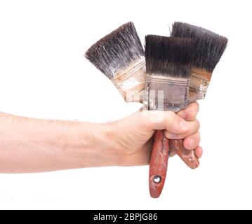 Old paintbrushes isolated on a white background Stock Photo