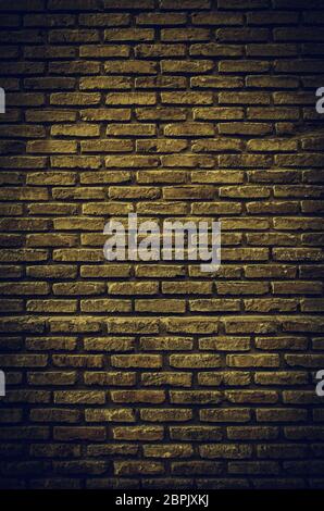 Fund damaged brick wall, detail of old bricks in the city, textured background Stock Photo