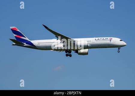 Munich / Germany - July 18, 2017: LATAM Brasil (Qatar Airways) Airbus A350-900 A7-AMA passenger plane arrival and landing at Munich Airport Stock Photo